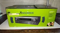 Front of retail box showing Insignia 6.1-channel receiver image and branding