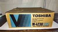 Side of Toshiba M-4230 retail box showing model and features