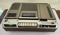 Top view showing entire Zenith VR9760W Betamax VCR with controls and deck