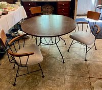 Full view of table with three chairs