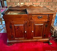 Front view of dry sink cabinet closed