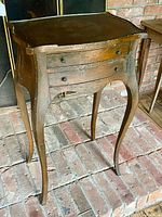 Front angled view showing overall form, drawers, cabriole legs