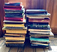 Two full stacks showing spines of all 48 books