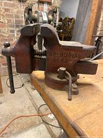 Side view of Columbian bench vise showing jaws, base and handle