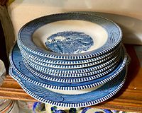 Stack of five blue and white bowls