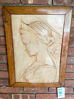 Front view of framed plaster relief