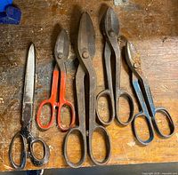 Five scissors/shears laid out for full view