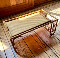 Oblique view of rattan breakfast tray on floor