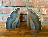 Front view of both bookends showing banding and polished faces