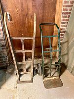 Both hand trucks side by side showing overall design and condition