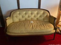 Front view of yellow silk settee loveseat