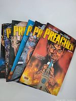 Six Preacher trade paperback volumes fan-spread, showing cover art