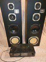 Full view of two speakers and cassette deck