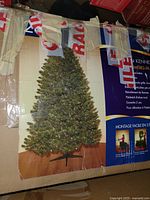 Box showing image of assembled tree and stand