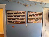 Both locomotive posters mounted on wall