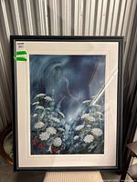 Full view of framed painting under glass