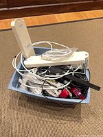 Tub filled with assorted cables and Hawking antennas