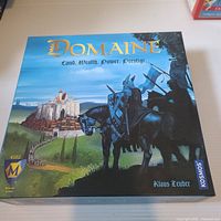 Front of Domaine board game box showing artwork, title, logos