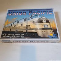 Front of Union Pacific board game box with train illustration and Rio Grande Games logo
