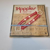Front of Trippples boxed board game showing title and graphics