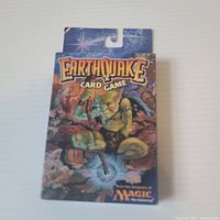 Front of sealed Earthquake Card Game box