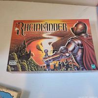 Front of the Rheinländer board game box showing title, artwork, Parker logo