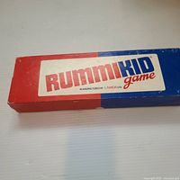 Box top showing Rummikid branding and manufacturer