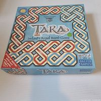 Front of boxed TARA board game showing title and Celtic artwork