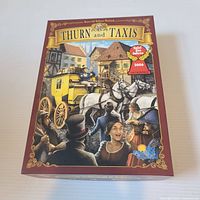 Front of Thurn and Taxis board game box showing title and artwork