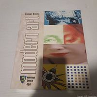 Box lid showing Modern Art title, Mayfair logo and Reiner Knizia credit