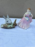 Both figurines side by side showing overall appearance