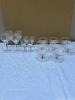 all 16 crystal pieces arranged on white cloth