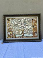 Framed Tree of Life canvas print front view on table