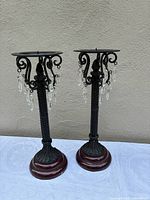 Full view of both candle holders showing design and bases