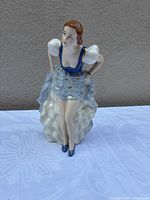 Front view of porcelain dancer figurine