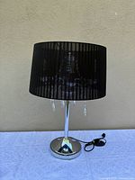 Full view of lamp with shade on
