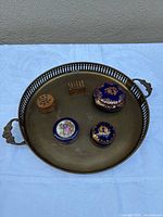 Overall view of brass tray with five trinket boxes