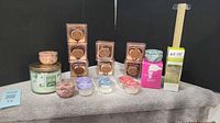 Full lot showing jar candle, tin candles, chocolate tealights, Scentsy pods, wax cups and diffuser boxes
