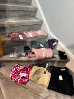 Overview of all clothing items on stairs