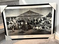 Entire framed photo showing image, frame and corner protectors