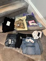 All seven garments laid out on stairs