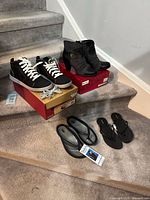 Group view of all four pairs: sneakers, booties, two flip-flops