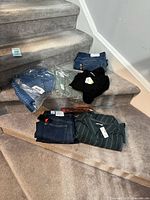 Group of all garments laid on stairs