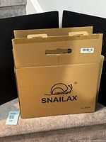 Closed Snailax branded box
