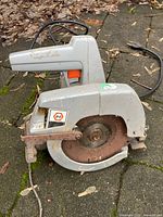 Full view of circular saw showing overall condition and rust