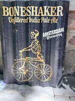 Front of Boneshaker corrugated metal sign showing graphics and text