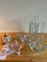 Group shot of all glass items on wooden surface