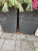 Front view of both planters side by side showing size and surface condition