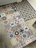 Both vinyl mats showing patterns and relative sizes