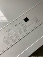 Top control panel with buttons and digital display